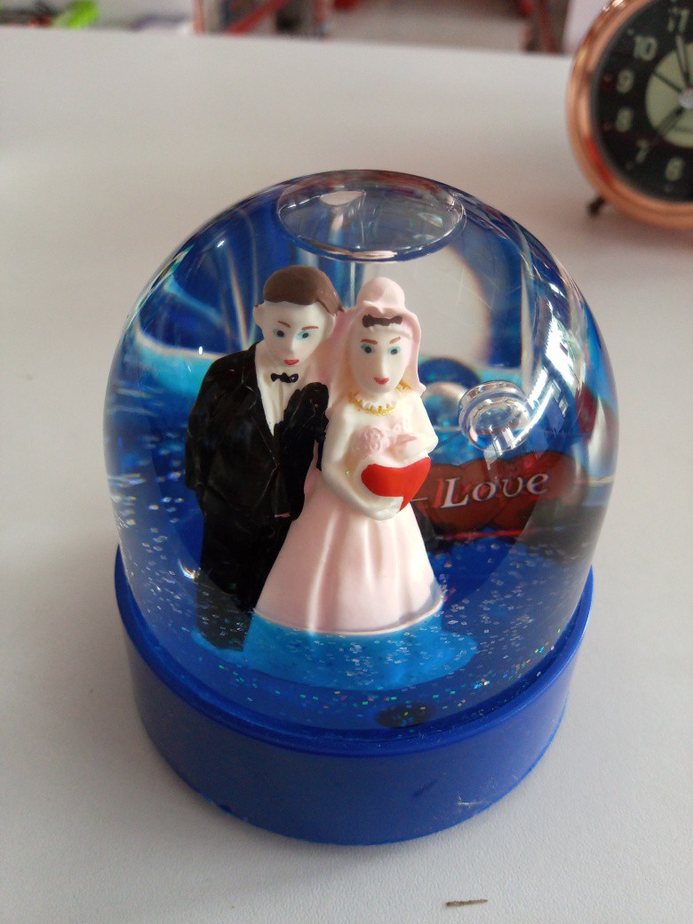 Awesome Doll paper weight